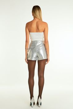 Our Silver Outpocket Shorts stand out with beautiful front details. A high waisted fit and back waist dart create a flattering silhouette. Show off the front patch pockets with buttons that add the perfect touch of style. An invisible side zipper closure makes for easy dressing. Stand out and upgrade your wardrobe with these unique shorts. High waisted Front patch pockets with buttons Back waist dart Side invisible zipper closure Lined ENGLISH Hand wash cold Do not bleach Do not tumble dry Do no Dressing Stand, Shorts High Waisted, Capsule Outfits, Knit Bottom, Easy Dressing, Tweed Dress, Blazer And Shorts, Romper With Skirt, Dress Cuts