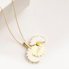 "Custom Daisy Necklace in Sterling Silver, Personalized Hidden Message Daisy Pendant is made by hand in our workshop with care. All our jewelry is the most elegant choice for the Bridesmaids, friends, your loved ones and for yourself. Custom Daisy Necklace in Sterling Silver, Personalized Hidden Message Daisy Pendant * Material: High Quality Solid 925 Sterling Silver. * Finish: Sterling Silver ∙ Gold ∙ Rose Gold. * All our jewelry is custom made by hand with care in our workshop.  HOW TO ORDER ❓ Handmade White Flower Shaped Necklace, Unique White Necklace For Anniversary, Handmade White Jewelry For Mother's Day, White Flower Pendant Necklace For Mother's Day, Handmade White Jewelry For Personalized Gift, White Handmade Jewelry For Mother's Day, White Sterling Silver Flower Necklace For Mother's Day, White Necklace With Flower Charm As Gift For Mom, Mother's Day White Sterling Silver Flower Necklace