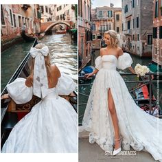 a woman in a white wedding dress standing next to a canal with gondolas