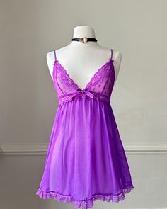 - Magenta sheer mesh slip dress featuring floral and polka dots bustier with lace embroidery lining - adjustable straps; keyhole back cutout; bows adorned - size S - stunning condition with no flaws 🤍 Size of mannequin: size 2 - 4 Sheer Sleeveless Lace Mesh Dress, Sleeveless Sheer Mesh Lace Dress, Sleeveless Sheer Lace Mesh Dress, Fitted Mesh Dress With Lace Trim, Sheer Bodice Dress For Night, Coquette Slip Dress With Spaghetti Straps For Parties, Summer Sheer Lace Slip Dress, Sheer Sleeveless Flirty Dress, Sheer Sleeveless Coquette Dress