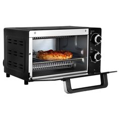 an open toaster oven with food cooking in it's door, on a white background