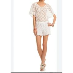 This Trina Turk Beach Cover Up Is A Chic Addition To Your Swimwear Collection. Size 14, It Features A White Crochet Lace Design, Perfect For Stylishly Transitioning From Beach To Bar. Size 14 White Crochet Lace Design Lightweight And Breathable Comfortable Fit Versatile Beach To Bar Style Excellent Newcondition. Ships From A Smoke Free Location. Measurements Taken With Item Laying Flat Bust Measurement Doubled. Bust 48 Inches Inseam 4 Inches Features: Romper/Cover Up Size: Womens 14 Condition: N Casual White Cover-up With Crochet Trim, Lace Trim Crochet Top For Beach, Casual Summer Lace Cover-up, Lace Crochet Top For Beachwear On Vacation, Spring Beachwear Crochet Lace Top, Spring Lace Crochet Top For Beachwear, White Lace Crochet Top For Beachwear, White Lace Crochet Top For Vacation, Beachwear Lace Tops For Beach Season