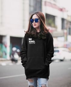 The Be Kind Korean Hoodie is the perfect gift for those who love all things Korean, K-fashion, K-pop, Korean BBQ, Tourism, Traveling or dream about traveling to Korea. This Shirt is Fashionable and Inspirational. This Sweater will make any outfit look cool and stylish The design includes both English and Hangul Korean writing and is printed on our Premium quality Shirts   PREMIUM QUALITY SHIRTS // FREE SHIPPING // GUARANTEED RETURN POLICY - HOW CAN YOU ORDER? - 1. Select the options that you want from the dropdown menu (Color and Size)  2. Add to cart and proceed to checkout. -PROCESSING TIME - We are so excited to offer to you expedited processing on all Happy Kimchi Design orders, which may take anywhere from 1 - 2 business days. SHIPPING DATE: When your package leaves our studio DELIVER Fall Hoodie With Branding, Branded Hooded Hoodie For Winter, Trendy Fall Hoodie With Branding, Branded Winter Hoodie, Hooded Fall Sweatshirt With Branding, Trendy Long Sleeve Hoodie With Branding, Casual Hooded Hoodie With Branding, Urban Hoodie With Branding For Winter, Urban Hooded Sweatshirt With Branding