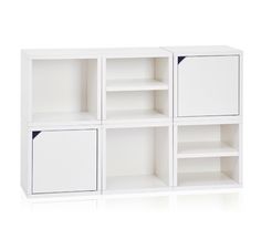 a white bookcase with four open compartments