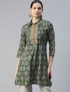 * Modal Shirt Collar Printed Ethnic Tunic Printed Kurti / Embroidered Short Kurti / Indian Tunic / Summer-Spring Evening Dress / Cotton Tunic Tops * Green and gold-toned printed tunic,has a shirt collar, three-quarter sleeves, embroidered detail *Fabric:- Modal  * Package Contains:-   Only One Kurti *Wash Care:- Hand Wash AVAILABLE IN 6 SIZES THEY ARE IN FOLLOWING MEASUREMENTS IN INCHES:- XS:- Bust-34/Waist-26/Length-36 S:- Bust-36/Waist-28/Length-36 M:- Bust-38/Waist-30/Length-36 L:- Bust-40/Wa Ethnic Kurti, Kurti Top, Tunic Tops Summer, Women Tunic, Cotton Tunic Tops, Indian Tunic, Short Kurti, Gold Shirt, Kurtis For Women