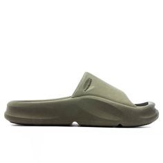 The Heron Preston Eco Moulded Slider is the ideal addition to any footwear collection. The slides feature a complete rubber construction in addition to engraved branding. The slip-on silhouette is finished with a treaded outsole and single strap. 100% rubber Slip-on design Engraved branding Treaded outsole All sizes are listed in European Men’s sizing unless stated otherwise Style No: HMIC004S23MAT0015900 Modern Slip-on Slides With Textured Sole, Textured Sole Slides For Streetwear, Comfortable Slides With Textured Sole For Streetwear, Green Slip-on Slides With Rubber Sole, Slip-on Slide Slippers With Textured Sole, Green Slides With Textured Footbed, Outdoor Slides With Textured Sole, Modern Slip-on Slides For Streetwear, Modern Rubber Sole Slides For Streetwear