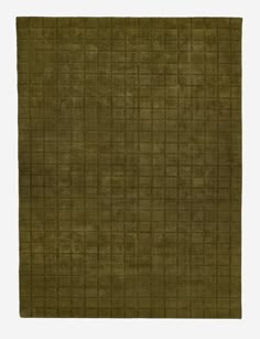 a green rug with squares on it