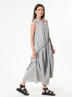 Gray Linen Dress With Asymmetric Hem - METD0237 With love for the extravagant we present your this unusual yet super trendy dress.  This sleeveless dress has an asymmetrical hem and ties all over the waist area with which you can adjust it and create various looks. Our elegant summer dress has buttons in the front and an interesting turtle-like neckline.  Don't worry about the summer heat waves because the high quality natural linen we used for this maxi dress keeps the warm away and cools your Fitted Sleeveless Lagenlook Dress, Fitted Linen Lagenlook Dress, Asymmetrical Linen Midi Dress, Casual Asymmetrical Linen Dress, Lagenlook Fitted Dress With Asymmetrical Hem, Spring Lagenlook Dress With Asymmetrical Hem, Spring Lagenlook Fitted Midi Dress, Asymmetrical Lagenlook Dresses For Spring, Elegant Summer Dress