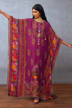 Purple kaftan featuring batwing sleeves, round neckline, and all-over ambrosia digital print, Fit: Relaxed Bohemian Silk Kaftan With Resham Embroidery, Festive Silk Purple Kaftan, Festive Purple Silk Kaftan, Traditional Kaftan With Digital Print And Kimono Sleeves, Festive Silk Kaftan With Digital Print, Traditional Digital Print Tunic Kaftan, Traditional Purple Silk Kaftan, Multicolor Silk Kaftan With Resham Embroidery, Festive Digital Print Kaftan For Eid