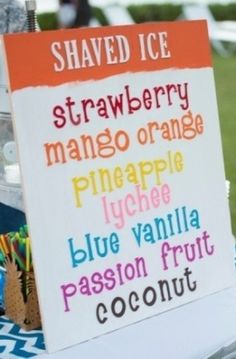 a sign that says shaved ice and strawberry mango orange pineapple blue vanilla passion fruit coconut