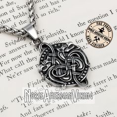 an image of a necklace on top of a book with the words, no more american viking