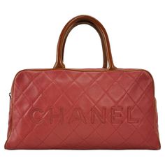 CHANEL Caviar Quilted Large Bowler Bag Red These are professional photos of the actual bag offered by Luxbags. This is a genuine CHANEL Caviar Patent Quilted Large Bowler Bag in Red. This classic style has regained popularity due to the influence of Bella Hadid and Korean K-pop sensation Jennie. Expertly crafted in red textured calfskin leather, this elegant Chanel duffel features brown rolled patent leather handles, stitched piping detail, and a stitched Chanel logo on the front. The top zipper reveals a matching leather interior with a zippered pocket. CONDITION: VERY GOOD This preloved item is in very good condition with signs of wear throughout. The leather appears worn with creased texture. Medium level scrapes to the piping at the bottom. Light scuffs around the opening, handles. Lig Red Caviar, Texture Medium, Bowler Bag, Structured Shoulder, Louis Vuitton Vintage, Professional Photos, Chanel Logo, Chanel Caviar, Chanel Vintage