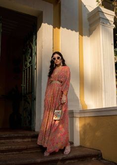 Our easy breezy festive wear kaftan expresses the classic romantic vibe, crafted using multiple prints which is digitally printed on pure georgette. The kaftan is accented with beautiful blooming floral and multi color stripes with dainty printed motifs. It is sprinkled using zari, floral sequins and mirror. It is has attached patch with is heavy embroidered. Bohemian Georgette Kaftan With Floral Print, Festive V-neck Maxi Dress With Floral Print, Festive Floral Print Maxi Kaftan, Floor-length Georgette Kaftan For Spring, Spring V-neck Kaftan With Digital Print, Spring Maxi Length Georgette Kaftan, Bohemian Georgette Kaftan For Spring, Spring Bohemian Georgette Kaftan, Anarkali Style Maxi Kaftan For Spring