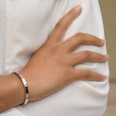 This Roberto Coin Verona Bangle bracelet features .15ctw diamond flowers set in the 18k white gold bangle. From the Italian designer's Love in Verona collection, the bangle bracelet features a hinged clasp. Details •18k white or yellow gold •4.5mm wide •0.15ctw of diamonds Style#8882970AWBAX Roberto Coin Love In Verona, Luxury White Gold Engraved Cuff Bracelet, Luxury Engraved White Gold Cuff Bracelet, Fine Jewelry White Gold Promise Bracelet, Fine Jewelry White Gold Cuff Bracelet With Diamond Accents, Engraved White Gold Diamond Bracelet For Anniversary, White Gold Cuff Bracelet With Diamond Accents, Anniversary Engraved White Gold Diamond Bracelet, White Gold Jubilee Cuff Bracelet With Cubic Zirconia