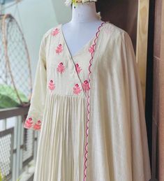 embroidered chanderi cream color Kurta with  dupatta /cream anarkali kurta suit set /white  kurta set dupatta USA/cream kurta with dupatta / Indian dresses/ voggish /white anarkali dress         Looking for a perfect indian dress/anarkali/suit sets that are trendy, unique and easy to carry !! yess, You are at the right place. we carry such versatile pieces of anarkalis and suit sets that really let you stand out in any occassion !!      featuring this beautiful mul chanderi silk embroidered Kurta in beautiful cream color with pink embroidery highlights and V neck and full sleeves paired matching embroidered soft chanderi scallop dupatta as shown !! A very classy, beautiful look makes your occasion Perfect !! Ready to ship !!  Details :  - color : pure handloom mul chanderi embroidered with White Kurta With Dupatta, White Anarkali Dress, Cream Anarkali, Indian Dresses Anarkali, Chanderi Anarkali, Dress Anarkali, Kurta With Dupatta, Suit With Dupatta, White Anarkali