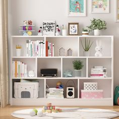 This is a modern style white bookcase, with different sizes of shelves to meet your storage needs of different sizes of books. Not only can it be used as a bookcase, but it can also be used as a display cabinet, you can put your own trophies, family photo albums, green plants, etc. on it, to dress up your warm and lovely home for you. FUFU&GAGA 41.3-in H x 55.1-in W x 9.8-in D White Composite Wood 10 Cube Organizer | LJY-JWL0113-04 8 Cube Organizer Decor, Cube Organizer Decor, Warm Office Decor, Organizer Decor Ideas, 9 Cube Organizer, Album Shelf, 8 Cube Organizer, Cube Drawers, Basement Playroom