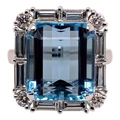 Luxury Fine Jewelry Topaz Baguette Cut Ring, Luxury Blue Topaz Jewelry With Diamond Accents, Exquisite Luxury Topaz Ring For Anniversary, Luxury Light Blue Brilliant Cut Topaz Ring, Luxury Blue Baguette Cut Topaz Ring, Luxury Blue Topaz Ring Gia Certified, Luxury Blue Topaz Ring In Platinum, Blue Diamond Ring With Baguette Diamonds, Blue Platinum Rings With Baguette Diamonds