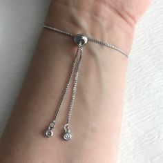 Please note: If you need more than one, multiple quantities are available upon checkout. This is a smaller version of my popular compass bracelet. A sweet little working compass is featured on this delicate chain bracelet. The chain is plated brass and is highly adjustable with a slider bead. The ends of the chain have two tiny cubic zirconia jewels. It is 10 inches in length. This bolo style of bracelet is easy to get on and off and can fit most wrists. No help needed to get it on and off! Due Compass Jewelry, Arrow Jewelry, Help Needed, Compass Bracelet, Arrow Ring, Bolo Bracelet, Jewelry Travel, Delicate Chain, Delicate Jewelry