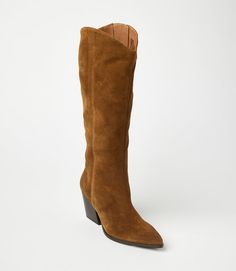 Crafted from soft suede, these pointed toe Western high boots are the perfect addition to any fall wardrobe. Pair them with jeans, skirts, or dresses for a versatile and stylish look that's perfect for the season's colors. With a sleek design and comfortable fit, these boots are a must-have. True to size Upper/Lining: Leather Heel height: 3" Platform: 0.25" Shaft Height: 17" Shaft Circumference: 14.5" Pointed toe shape Full zipper closure at inner ankle Imported Seychelles | Karen Kane Pointed T Wide Calf Suede Boots For Fall, Suede Snip Toe Boots For Work, Fall Suede Pointed Toe Boots, Fall Suede Boots With Pointed Toe, Fitted Suede Heeled Boots With Snip Toe, Fall Suede Knee-high Boots With Pointed Toe, Fall Suede Heeled Boots With Wide Calf, Suede Knee-high Boots With Pointed Toe For Fall, Fall Wide Calf Suede Heeled Boots