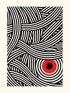 an abstract black and white pattern with red eye