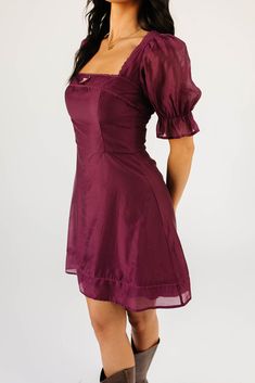 both moody + enchanting, this zoco exclusive puff sleeve mini dress was made for cocktail parties, fancy dinner dates, + anything that calls for a hint of sophistication. with its sleek cinch waist silhouette + dainty bow detail, it’s a timeless classic you’ll be wearing again + again, season after season. plum // mini length, square neckline, puff sleeves, elastic cuffs, bow detail, lace trim detailing, back tie, smocked back, back zipper closure, lined model is 5'8" + wearing a small measureme Plaid Puff Sleeve Dress, Purple Chic Mini Dress With Square Neck, Chic Purple Mini Dress With Square Neck, Chic Purple Square Neck Mini Dress, Flirty Mini Length Puff Sleeve Dress For Night Out, Purple Fitted Mini Dress With Puff Sleeves, Flirty Mini Dress With Gathered Sleeves For Date Night, Purple Puff Sleeve Mini Dress For Brunch, Purple Puff Sleeve Mini Dress For Party