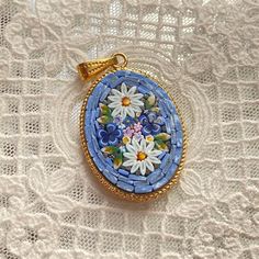 Italian Florentine Micromosaic Jewelry, a brand new product in vintage antique style, made in Italy. Wedding gift.🇮🇹 🩰This is made to order and needs 3-6 weeks to make. It's a brand new product but made in vintage style. CM.2.5x3.5 The price is for one single piece. ⚜️You can choose a background color(Option: primary color) Random floral patterns, our products are manufactured and completed with meticulous work by a mosaicist using Murano glass and enamels.  Each piece is produced individually, completely handmade by craftsmen employing a variety of colors, patterns, and motifs.  Please note: Each item comes differently and we cannot guarantee which one you will receive. 🩰More items on our webside https://laballerinagallery.com Information: laballerinagallery@gmail.com Mosaic Pendants, Micro Mosaic Jewelry, Mosaic Jewelry, Italy Vintage, Gold Pendant Jewelry, Pretty Pendant, Antique Wedding, Micro Mosaic, Italian Jewelry