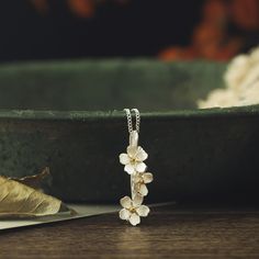 This timelessly stylish necklace offers a sumptuous blend of gold on sterling silver in a captivating cottage-inspired design, creating an exquisite and truly one-of-a-kind piece. The delicate Forget-Me-Not flowers, delicately crafted from fine metals, will serve as a beautiful reminder of your lasting appreciation and make a wonderful and thoughtful gift. DETAILS Plating: 18k Gold  Materials: 18k Gold on Silver Pendant Size: 1.06"*0.31"(27mm*8mm ) Weight:  7.2g Diamond Star Necklace, Star And Moon Necklace, Forget Me Not Flower, Flowers Jewelry, Diamond Evil Eye, Detailed Necklace, Lucky Bracelet, Nature Necklace, Evil Eye Earrings