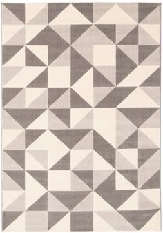 a gray and white rug with triangles on it