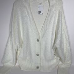 Fluffy Oversized Comfy White Button Up Sweater By H&M Size Large 3 Beautiful Diamond Buttons New With Tags, Has Never Been Worn White Soft Knit Classic Cardigan, White Cardigan With Buttons For Spring, White Cardigan With Button Closure For Spring, White Casual Cardigan With Buttons, White Buttoned Cardigan For Spring, H&m White Outerwear For Fall, White H&m Outerwear For Fall, Classic White Soft Knit Outerwear, H&m White Sweater For Spring