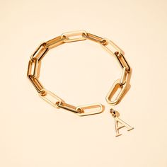 Stylish and chic, add a personalized charm of your choice to this bracelet by using the hinged link. To finish add a sweet hand-engraved message to your chosen charm to make this piece the perfect personalized gift.Available in 18K Champagne Gold PlatedChain length & style: 7 Hinged BraceletSecure clasp fasteningCharms can be added and removed from this chain and can be worn on all Merci Maman chain lengthsSent with love in a complimentary gift box Personalized Gold Jewelry With Cable Chain, Personalized Yellow Gold Cable Chain Jewelry, Personalized Minimalist Chain Link Jewelry, Personalized Yellow Gold Oval Link Jewelry, Modern Personalized Yellow Gold Chain Bracelet, Personalized Modern Yellow Gold Chain Bracelet, Chain Link Gold Bracelet As Gift, Personalized 14k Gold Link Jewelry, Classic Chain Bracelet With Charms For Gift