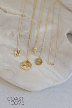 This beautiful Gold Sanibel Necklace is crafted from 14k gold vermeil and shaped like a flat scallop shell. Our gold jewelry pieces are durable and made to layer and stack. Style this as a simple everyday necklace, or layer it in a gold necklace stack. However you style it, this piece is a timeless reminder of the beauty of the ocean. Elegant Shell Pendant As A Gift, Elegant Shell Pendant As Gift, Elegant Shell Pendant For Gift, Ocean-inspired Gold Pendant Jewelry, Gold Ocean-inspired Pendant Jewelry, Elegant Gold Shell-shaped Jewelry, Elegant Sterling Silver Shell Jewelry, Elegant Jewelry With Oyster Bracelet, Ocean-inspired Gold Sterling Silver Jewelry