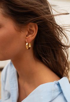 Experience the luxurious look and feel of our golden hoop earrings, crafted with a sleek stainless steel finish. Golden Hoop Earrings, Golden Hoops, European Women, Summer Jewelry, Designer Earrings, Accessories Design, Summer Women, Jewelry Accessories, Hoop Earrings