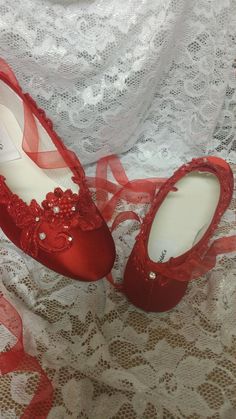 True Red Ballerina slipper style flat shoes, embellished with red lace and Crystals I meticulously designed these beautiful Red shoes fit for a real princess on her wedding day A Holiday Wedding Or, Valentines Wedding, or any one who loves Red I hand dyed and hand embellished them, these are not found in stores I used beautiful first class elements: Bridal lace trim, organza red ribbon to match the shoes US Adult Sizes: 5, 5.5, 6, 6.5, 7, 7.5, 8, 8.5, 9, 9.5, 10, *11 & *12 and W Wide width f Red Lace Shoes, Red Ballet Shoes, Red Ballerina, Red Ballerinas, Red Shoes Flats, Valentines Wedding, Wedding Slippers, Red Slippers, Real Princess