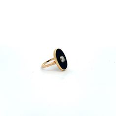 This unique 14k yellow gold ring showcases a one-of-a-kind onyx stone and diamond, perfect for a size 6 fit. Modern 14k Gold Enamel Round Ring, Modern Round Enamel Ring In 14k Gold, Elegant Black Enamel Diamond Ring, Timeless Oval Black Enamel Jewelry, Diamond Enamel Ring With Black Enamel, Elegant Oval Black Enamel Ring, Black Enamel Diamond Ring In Fine Jewelry Style, Black Diamond Enamel Ring Fine Jewelry, Oval Diamond Jewelry With Black Enamel