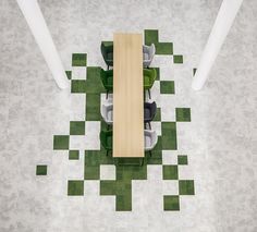 an overhead view of a table and chairs in a room with checkered flooring