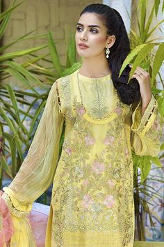 Beautiful Crinkle chiffon dress for party wear. Yellow color dress is embellished with thread embroidered crinkle chiffon shirt.Over all dress is embellished with multi color thread embroidery by giving a lavish look to outfit. Trouser: Pakistani crinkle chiffon dress is paired with raw silk trouser in matching color embellished with embroidered patches. Dupatta: Embroidered crinkle chiffon dupatta is fully embellished with thread embroidery and side embroidered borders. Detailed Description: SK Cream Color Dress, Dress For Party, Navy Blue Shirt, Navy Blue Shirts, Long Cut, Pakistani Bridal Wear, Silk Trousers, Indian Wedding Photography, Thread Embroidery