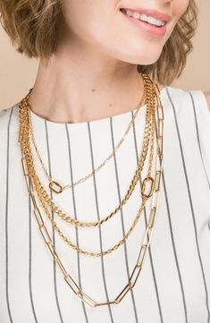 Mixed chains style a four-layer necklace that's perfect for a chic look.