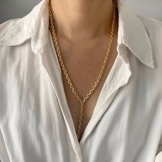 "18K Gold Chain Lariat Necklace | Chunky Chain Y Necklace | Gold Chain Link Layering Necklace | Long Drop Necklace | Statement Necklace  This seamless design lariat is made with gorgeous, solid gold tone chain with etched links that sparkle.  Perfect to layer it for everyday wear.  Super chic and minimal that goes well with all outfits. Lariat necklace with 3\" drop in the center. Check out more styles in our shop: https://jordanskyjewelry.etsy.com Handmade and designed in NY. ------------------------------- M A T E R I A L S  18 Karat gold plated - Non tarnish Stainless Steel Thanks for supporting our small business❤︎ --------------------------------  L E T ' S * C O N N E C T Check out @jordanskyjewelry on Instagram for sales and giveaways!   Enjoy your jewels!! xoxo" Y Necklace Gold, Long Drop Necklace, Necklace Outfit, Necklace Gold Chain, Lion Necklace, 18k Gold Chain, Long Silver Necklace, Y Necklace, Gold Long Necklace