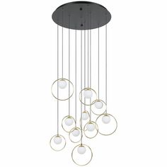 a chandelier with eight balls hanging from it's center and four lights on each end