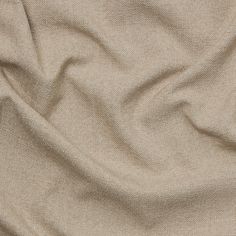 an up close shot of a tan fabric