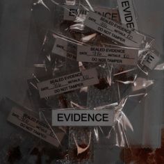 there are many signs that say evidence and don't touch them on the wall