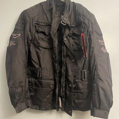 This Jacket Is Brand New. It Was Never Worn. This Jacket Is Just Laying Around In The Closet. The Material Inside Neck Of This Jacket Has Some Imperfections. Look At The Pics. Some Of The Material Is Rubbing Off. This Is Probably Caused From The Hot Storage Room. This Doesn’t Take Anything Away From The Function Of The Jacket Moto Biker Jacket With Long Sleeves For Outdoor, Fall Motorcycling Outerwear With Pockets, Moto Style Hooded Outerwear For Motorcycling, Casual Winter Outerwear For Motorcycling, Winter Hooded Outerwear For Motorcycling, Moto Biker Jacket With Pockets For Motorcycling, Moto Style Long Sleeve Outdoor Outerwear, Casual Hooded Outerwear For Motorcycling, Winter Moto Outerwear For Motorcycling