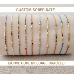 A great reminder of sobriety in this secret Morse code message bracelet with one's sober date spelled out in Morse code. 🖤 Dainty and subtle, one's custom sober date is spelled out in Morse code alphabet using  high quality .925 Sterling silver, 14 karat gold fill, rose gold, and 14 karat solid gold beads. 🖤 Band is made from durable, high quality 100% silk cord in your choice of color. 🖤 End beads and closure bead are coordinating sterling silver or 14 Karat gold / rose / fill. 🖤 Closure is Morse Code Alphabet, Code Alphabet, Bts Bracelet, Secret Message Bracelet, Code Morse, Mens Bracelet Personalized, Morse Code Necklace, Coded Message, Message Bracelet