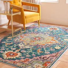 a blue rug with an orange chair in the corner and a yellow chair next to it