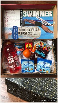 an open box filled with various items on top of a wooden table