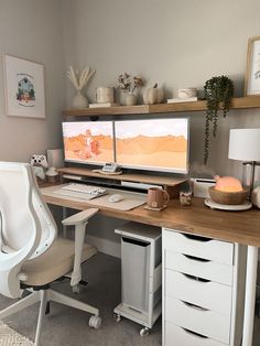 a computer desk with two monitors on it