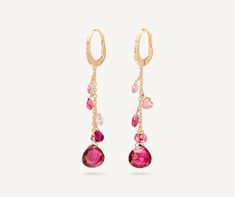 Delicate and elegant, these 18K yellow gold pendant earrings are embellished by a precious clip back closure with brilliant-cut diamonds and a cascade of finely selected heart-cut pink tourmalines that enrich the jewel with their intense shades. Tourmaline Earrings, Yellow Gold Pendants, Pendant Earrings, High Jewelry, Pink Tourmaline, Brilliant Cut Diamond, Gemstone Colors, Gold Pendant, Colored Diamonds