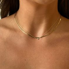 16" solid 14k yellow gold super dainty herringbone necklace. made with recycled metals in the usa.  due to its delicate nature, you may want to remove this piece while sleeping. 18k Solid Gold Necklace, 14k Gold Yellow Gold Herringbone Necklace With Delicate Chain, 14k Yellow Gold Delicate Herringbone Necklace, Minimalist Yellow Gold Herringbone Necklace For Layering, Dainty Herringbone Necklace For Everyday, Dainty Yellow Gold Herringbone Necklace For Everyday, Dainty Yellow Gold Herringbone Necklace, Minimalist 14k Yellow Gold Herringbone Necklace, 14k Gold Herringbone Necklace