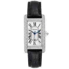 Cartier Tank Americaine White Gold Diamond Ladies Watch 2490. Automatic self-winding movement. 18k white gold case 22.0 x 41.0 mm. Octogonal crown set with an original Cartier factory diamond. Original Cartier factory double-row diamonds lug to lug. 18k white gold bezel with original Cartier factory double-row diamonds. Scratch resistant sapphire crystal. Silvered guilloche dial with black Roman numerals. Blued steel sword shaped hands. Secret Cartier signature at VII. Date window at 6 o'clock. Cartier White Gold Diamond Watch For Anniversary, Cartier Diamond Watch In White Gold For Anniversary, Timeless White Gold Diamond Watch For Everyday Luxury, Luxury White Gold Diamond Watch With Single Cut Diamonds, Platinum Diamond Watch With Brilliant Cut For Formal Occasions, Formal Platinum Diamond Watch With Brilliant Cut, Brilliant Cut Platinum Diamond Watch For Formal Occasions, Cartier Diamond Watch With Diamond Hour Markers For Anniversary, White Gold Watches With Diamond Hour Markers For Evening