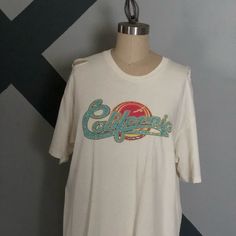 Vintage Tee California Print With Added Premium Crystals New Free People Off White Color. #Rockdatee White Letter Print Top For Day Out, Trendy White Top For Brunch, Trendy White Tops For Brunch, White Crew Neck Summer Top, Trendy White Vacation Tops, White Summer Crew Neck Top, White Graphic Tee For Day Out, White Short Sleeve T-shirt For Brunch, Casual Graphic Print Tops For Brunch